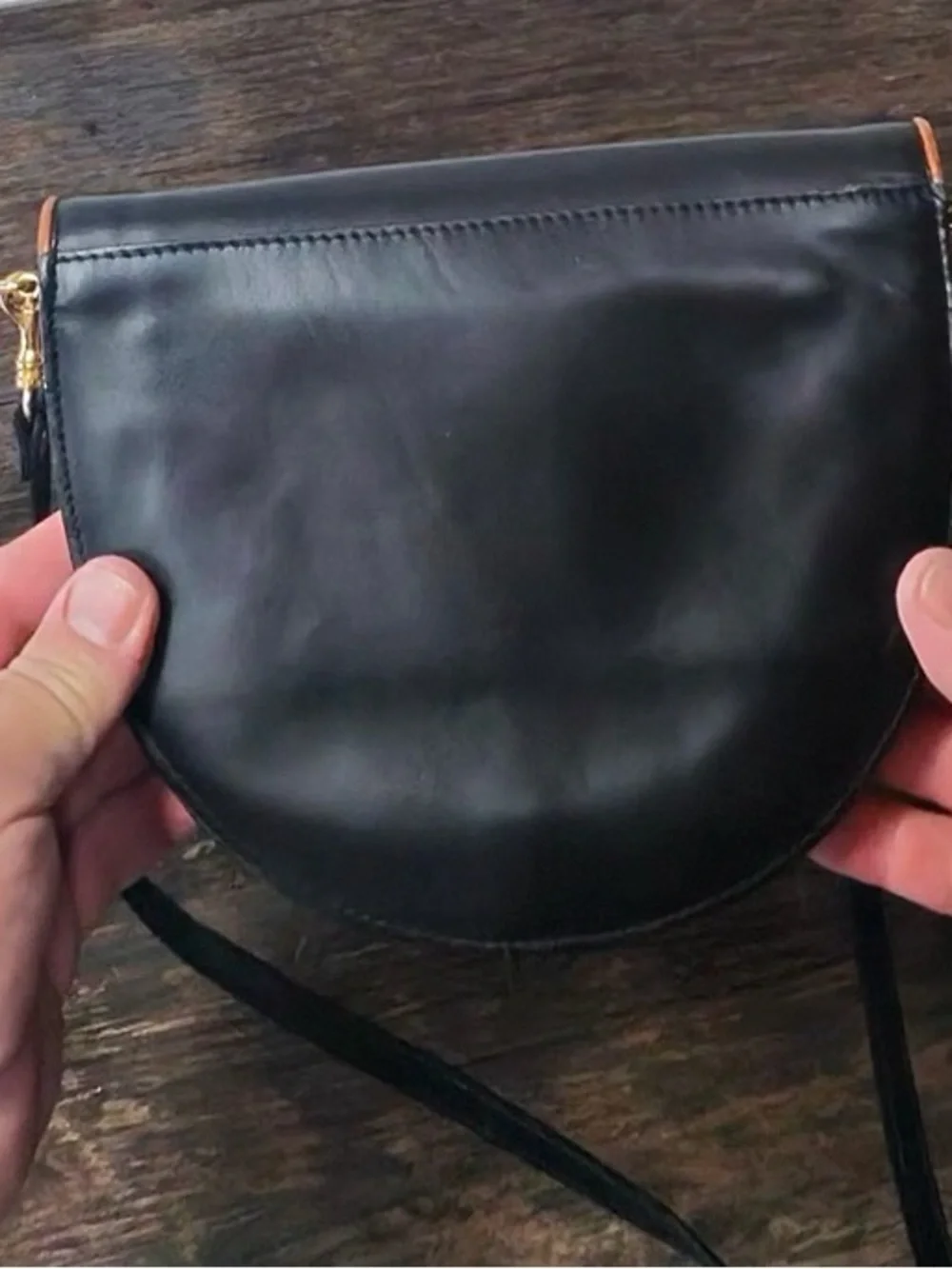 Leather Crescent Crossbody Bag in Black with Brown Trim